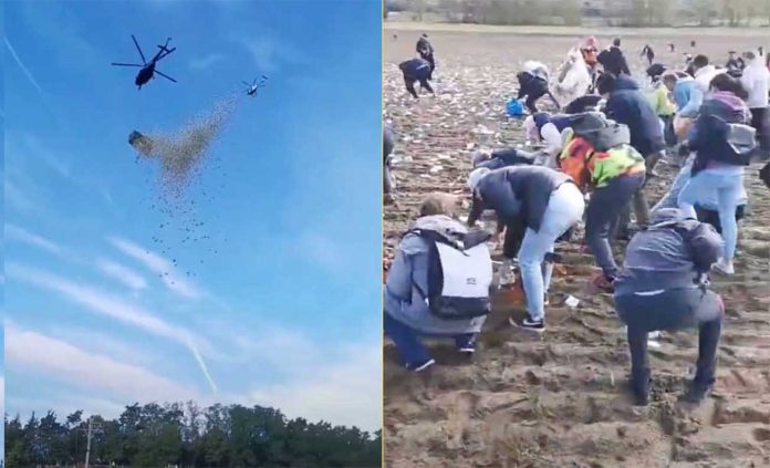 З гелікоптера розкидали гроші на поле